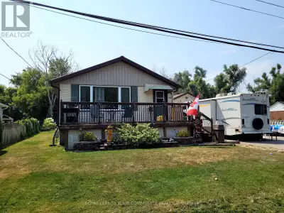 Charming 2-Bedroom Bungalow with Workshop Near Lake Simcoe. Welcome to this delightful 2-bedroom bun...