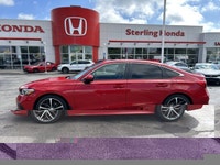 Experience the thrill of driving the 2023 Honda Civic Sedan Touring, a certified pre-owned beauty wi... (image 7)
