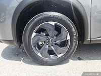 This AWD Rogue features a turbocharged engine, heated front seats, heated steering wheel, and a pano... (image 9)