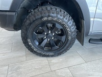 ===== Key Features ===== * 70,141 km * One Owner * Rebel Trim * 4WD (Four-Wheel Drive) * V8 Engine *... (image 7)