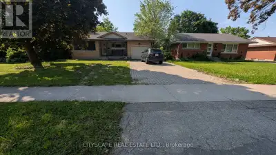 Brick bungalow sitting on a huge 55 x 128 ft lot in a Up-town Waterloo neighbourhood, walking distan...