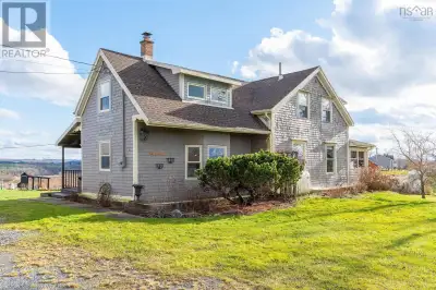Hobby farm heaven awaits! This beautifully restored and updated 5 -bedroom, 2.5-bath century home on...