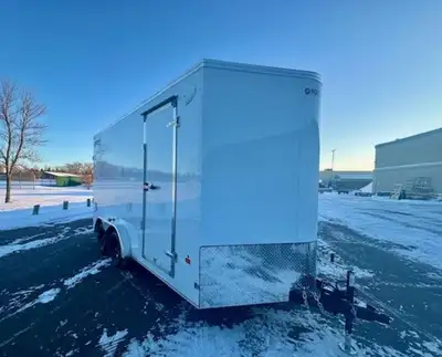 7.5x16(14+2) v-nose cargo trailer. 86 inch interior wall height. Ramp door. Comes with spare tire. W...