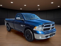 Experience the perfect blend of power and style with the 2020 Ram 1500 Classic SLT 4x4 Reg Cab, dres... (image 7)