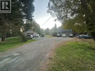 Single family dwelling with additional income generating property! Two 3-bed homes on a 1 Acre lot....