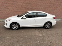 WHITE ON GREY CLOTH, DRIVES GREAT, NON SMOKER, 5 SPEED MANUAL.NEW SHOCKS, NEWER ALL SEASON TIRES. CE... (image 5)