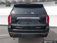 Experience the premium capability and rugged refinement of the 2023 GMC Yukon XL AT4. This used full... (image 4)