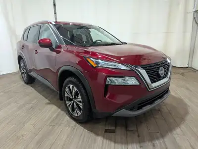 Experience the exhilarating 2022 Nissan Rogue AWD SV in vibrant red, ready to conquer any terrain wi...