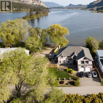 Breathtaking Property surrounded by nature in all it's glory! This truly is an amazing LAKE FRONT HO...