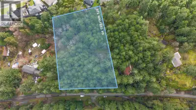 Rare 2.02 acre forested property offering peaceful seclusion while remaining close to major amenitie...