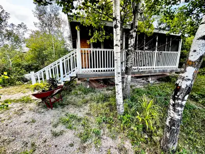 1 Country Lane E Steep Rock $159,900 Charming Cottage & Guest House on a Spacious Corner Lot in Scen...