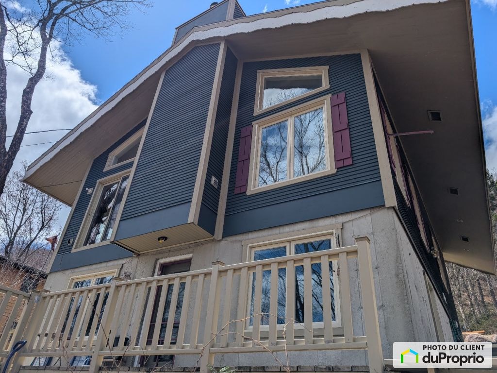 $573,000 - Bi-Level for sale in Lac-Beauport — photo 1