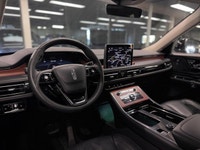 The 2024 Lincoln Aviator Reserve is a refined and powerful three-row luxury SUV that offers a compel... (image 7)