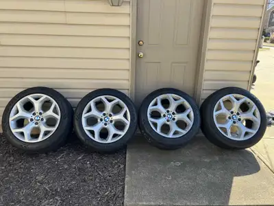 4 OEM bmw x5 rims 255/55/18 MICHELIN x ice WINTER tires about 80% tread left good condition ,, No pa...