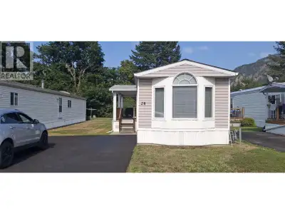 Welcome to this well-cared-for two-bedroom mobile home in desirable Mountview Mobile Home Park! The...