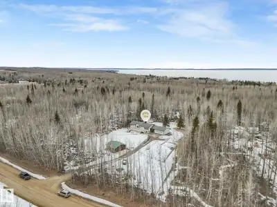 Welcome to Woodwind Estates. This exceptional 2.64-acre Bungalow offers privacy, space, and close pr...