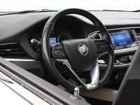 The Buick Enclave delivers premium comfort, refined style, and powerful performance in a spacious th... (image 6)