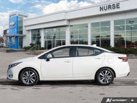 The former daily rental 2024 Nissan Versa SV, dressed in an eye-catching Aspen White TriCoat, presen... (image 2)