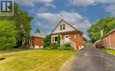 Welcome to this bright and beautifully updated 1.5-storey detached home, perfectly situated on a spa...