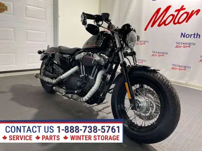 Very Cool Canadian Forty Eight Harley at True North Motor Sports has 21,778 kms. XL1200 Evolution En...