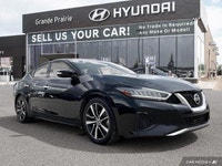 Experience effortless power and sophisticated style behind the wheel of this 2022 Nissan Maxima SL.... (image 7)