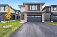 Immaculate sun-filled home with numerous upgrades