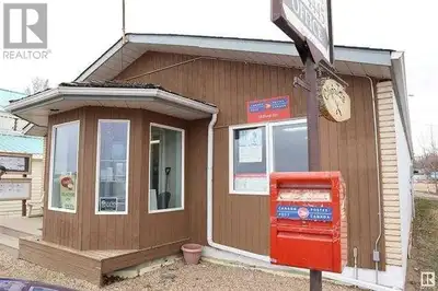 Located on Lake Drive at Mulhurst Bay, overlooking Pigeon Lake. 2029 sq. ft. retail building built i...