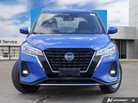 Navigate city streets with confidence and style in the 2022 Nissan Kicks S, striking in Electric Blu... (image 1)