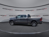 The 2022 Ram 1500 Limited Crew Cab blends rugged capability with refined luxury, offering an impress... (image 5)
