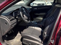 The 2023 Chrysler 300C in Velvet Red Pearl offers a commanding presence with exhilarating performanc... (image 4)