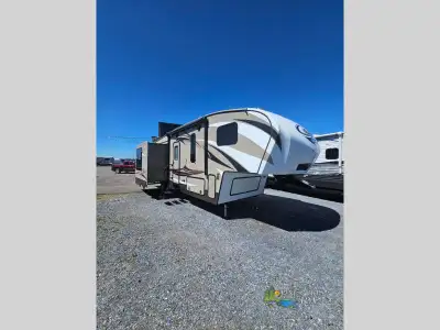 Three slide out are responsible for giving this Cougar X-Lite rear living fifth wheel its spacious f...