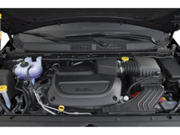 The 2026 Chrysler Pacifica Select in shimmering silver with Front-Wheel Drive offers smooth, confide... (image 8)