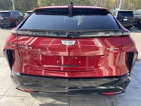 The 2026 Cadillac LYRIQ Signature Sport, finished in Radiant Red Tintcoat with a refined Oxford Ston... (image 7)