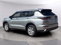 Introducing the 2026 Mitsubishi Outlander Plug-In Hybrid SE S-AWC, gliding in with a captivating sil... (image 4)