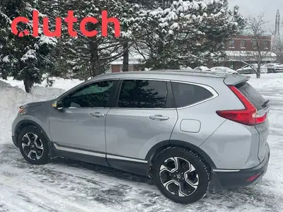 Power Tailgate/Hatch, Auto Dimming Rearview Mirror, Front Heated Seats and more! Clutch is the large...