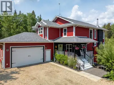 Stunning Private Acreage Backing onto Town Land. This exceptional property offers the best of both w...