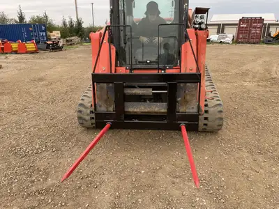 Double bale spears, 49” tines. Move round bales with your skid steer. Safety frame included. Skid st...