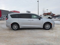 The 2026 Chrysler Grand Caravan SXT in Silver Mist with a Black interior combines versatility, comfo... (image 7)