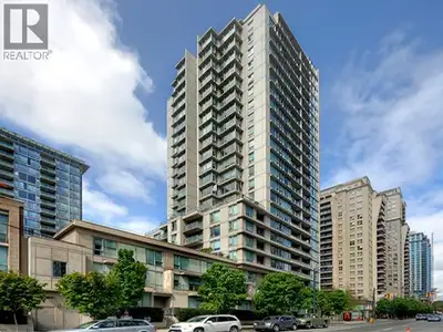 This 529sf, 1 bedroom + den, unit has white oak wide plank laminate floors throughout the living are...