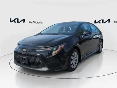 Experience the stylish and reliable 2021 Toyota Corolla LE in a sophisticated black finish, complete...