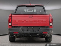 Introducing the 2026 Honda Ridgeline Black Edition AWD, a stunning red truck designed for those who... (image 4)
