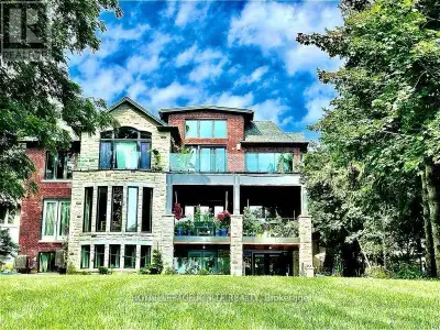 Luxurious Lower Unit Walkout to Lake Ontario. Lakeview from 2 Bedrooms, Dining, Kitchen and Windows....