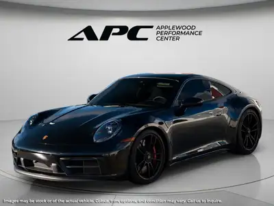 The 2022 Porsche 911 Carrera S Coupe, with its sleek design and captivating silhouette, is a masterp...