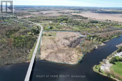 INCREDIBLY RARE!!!! A 22-Acre Rideau River Waterfront Gem!!! Seize this exceptional 22-acre vacant p...