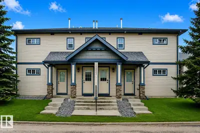 Condo living at its finest! This top-floor unit features lovely vaulted ceilings that create a brigh...