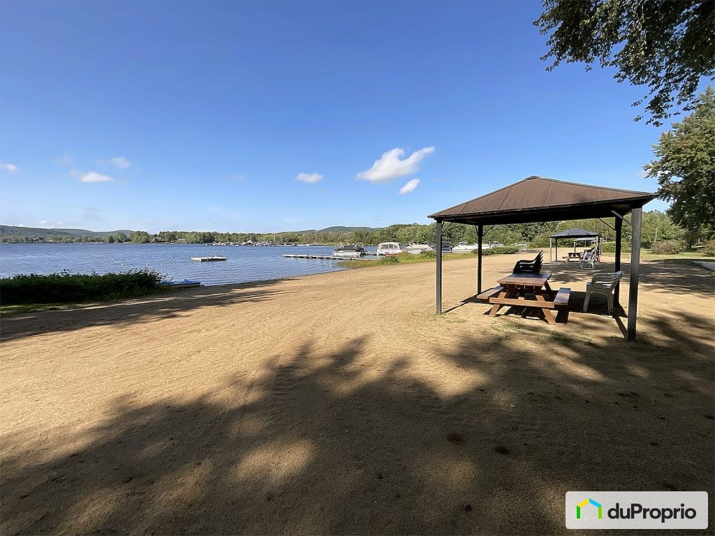 $225,000 - Cottage for sale in Mandeville — photo 2