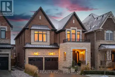 Stunning stone & brick home in the heart of King City offering over 4,000 sq ft of finished luxury l...