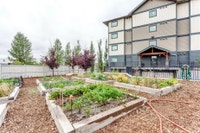 Amenities: In-Suite Laundry • Community Garden • Playground • Elevators Suite & Building: One-bedroo... (image 3)