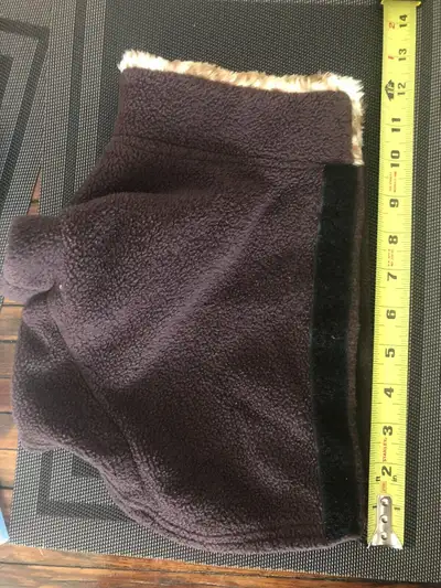 Fleece coat with leopard trim. Measures 10” from neck to tail.. Pickup in Oakvile, Port Credit or Pi...