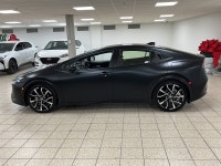 Rush-hour traffic slows to a crawl, but the cabin around you feels more like a modern tech lounge th... (image 2)